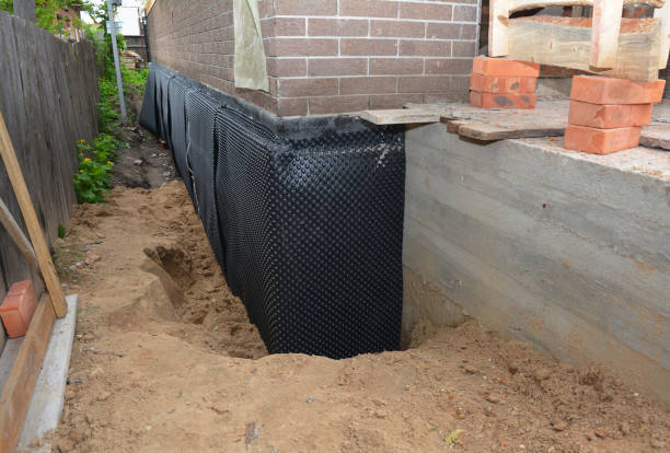 SJ Waterproofing Pros technician performing targeted Vapor Barrier Installation assessment in Avon, OH